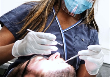 Dentist treating a patient
