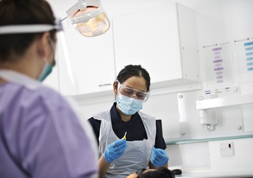 Dental professionals at work