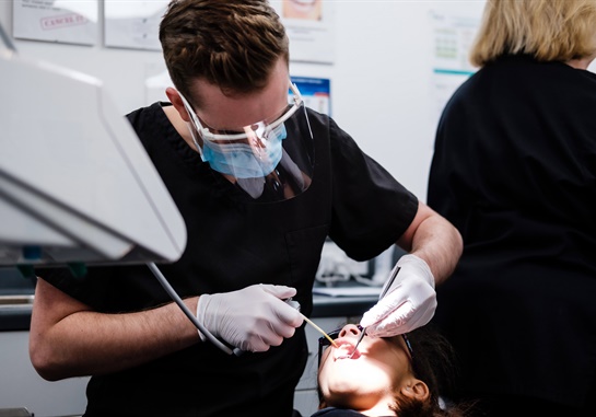 Dentist with patient