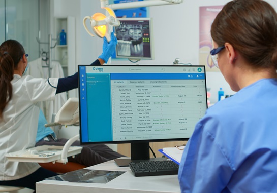 Dental professional using a pc