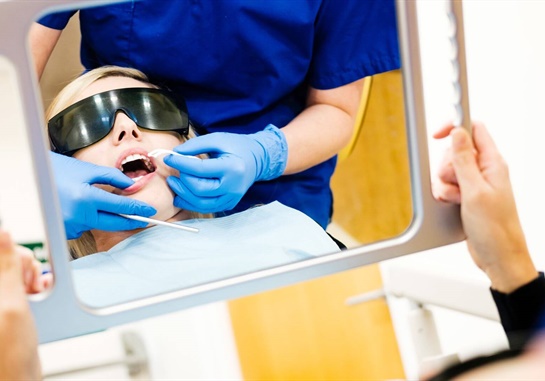 Dentist with tools