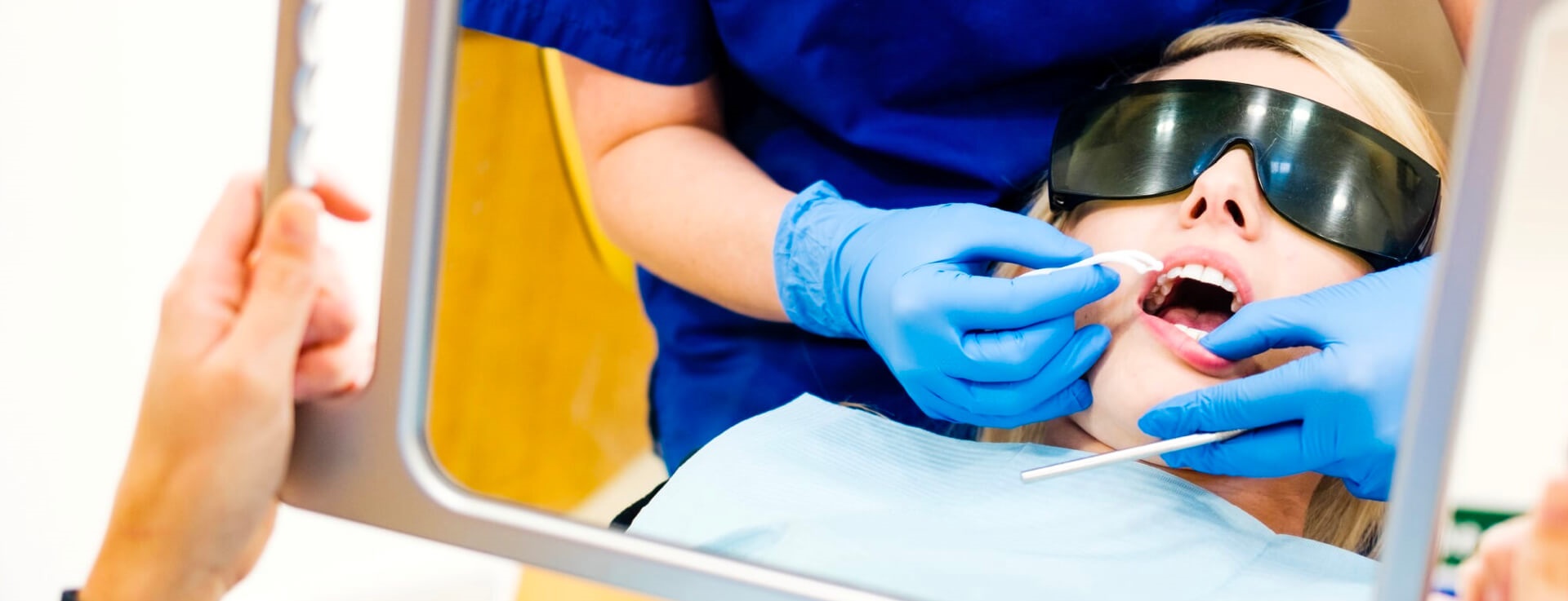 Dentist treating patient