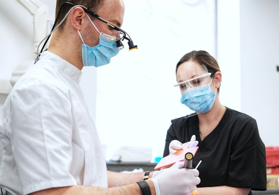 img-016 Two dentists with tools