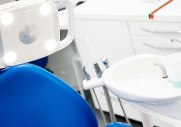 How do I report illegal tooth whitening or dentistry?